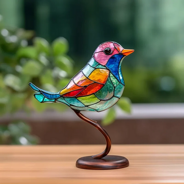 Dekorative Tischfiguren: Bunte Vögel auf einem Ast