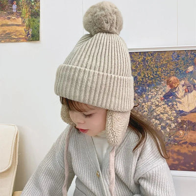 Warme Strickmütze für Kinder mit Ohrenklappen für den Winter