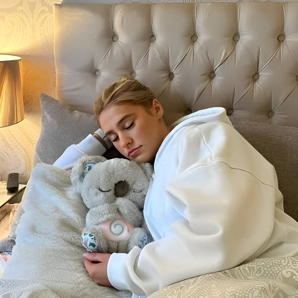 Beruhigendes Koala-Plüschtier mit Musik, Licht und rhythmischer Atembewegung zur Angstlinderung